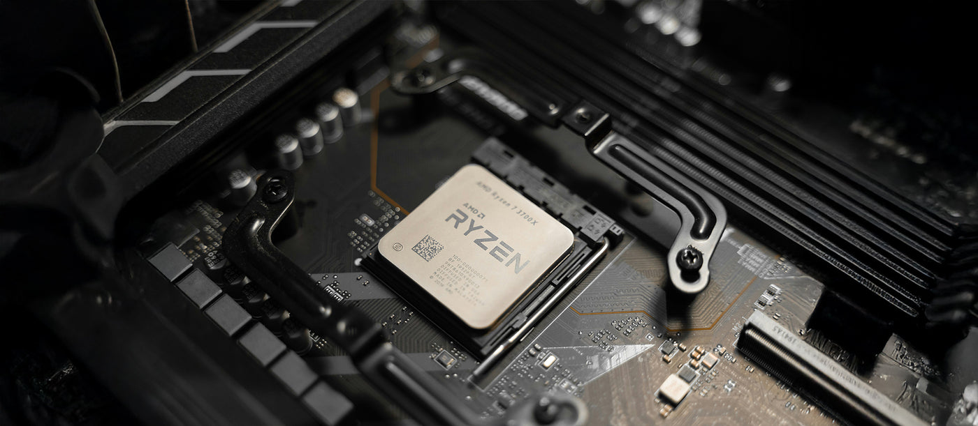 AMD Ryzen processor installed on a motherboard, representing business-grade computing components.