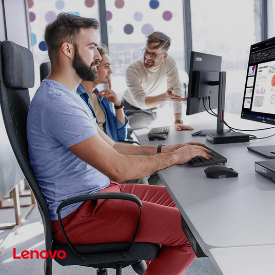 Teams collaborating with Lenovo devices for sustainable workplace IT