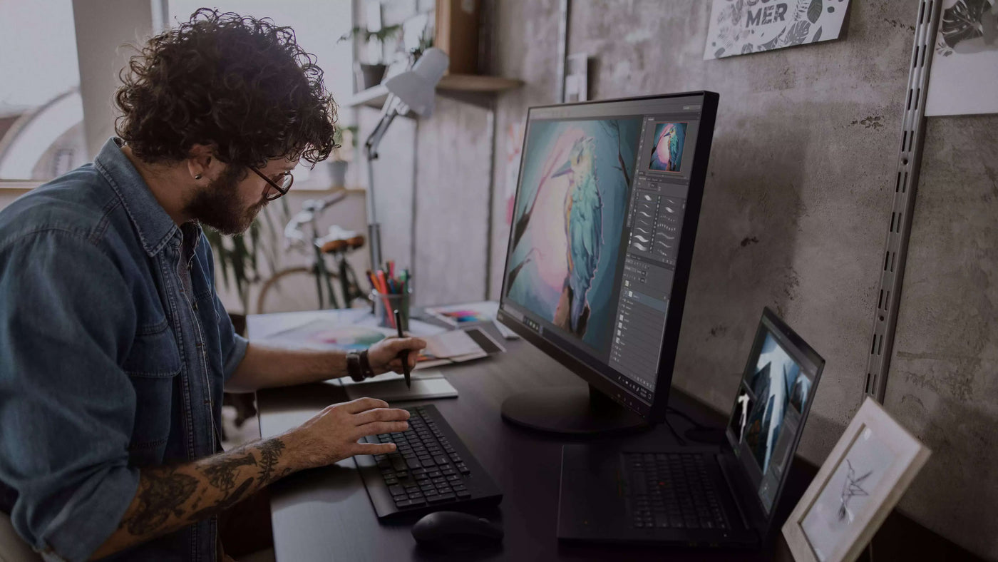 Business professional using Lenovo devices in a modern office